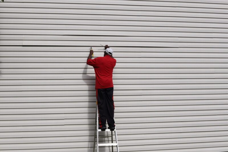 How to Hang Heavy Things on Vinyl Siding